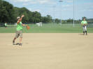 Chad V. lofts a pitch, Aaron at 1st and Andy in the outfield (July 2008)