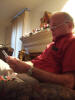 Dad read a Christmas card (Dec 2006)