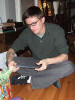 Brian opens a gift (Dec 2006)