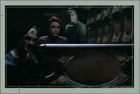 Damar, Kira, and Garak resort to hiding in the cellar of Mila, once housekeeper for Garak's family