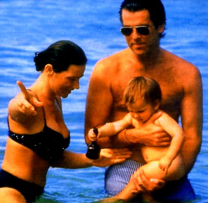 Pierce Brosnan with his girlfriend and his son