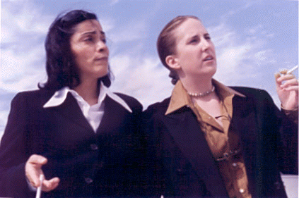 [Marga Gomez and A. Rosser Goodman]