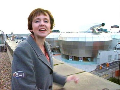 [image] The Millard overlooking a huge drum-shaped building