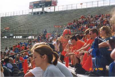 A view of the crowd, and of the Mud Dogs Mascot