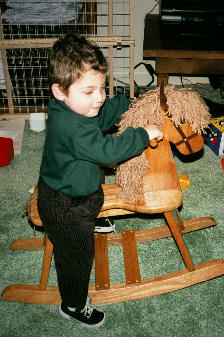 Ari on rocking horse