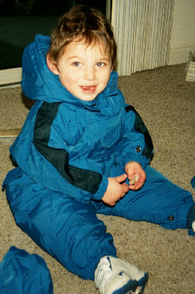 Ari in snowsuit