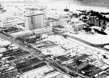 Fourth Avenue, Anchorage, looking West.