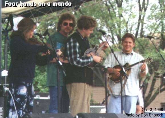 Chris Thile and Sam Bush play the same mandolin