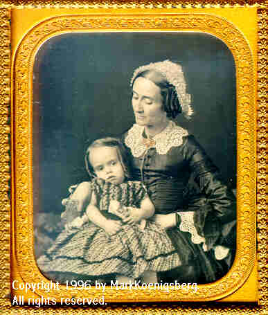 Sixth-plate daguerreotype of Woman Looking  off to side and Child