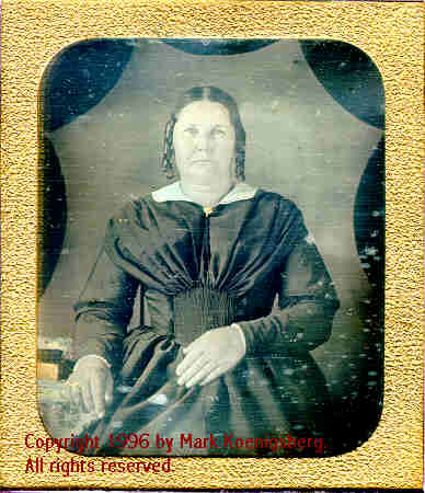 Sixth-plate daguerreotype of Woman in Irregulrly-shaped Vignette