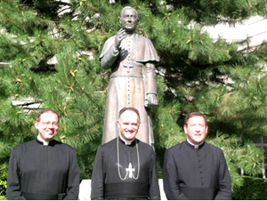 The re-elected Superior General and his two assistants