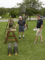 Visitors to Solomons examine a field shower