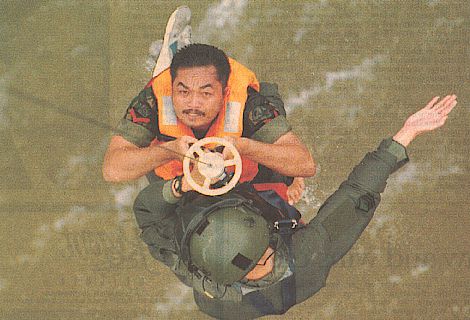 a 'downed' indonesian pilot being rescued