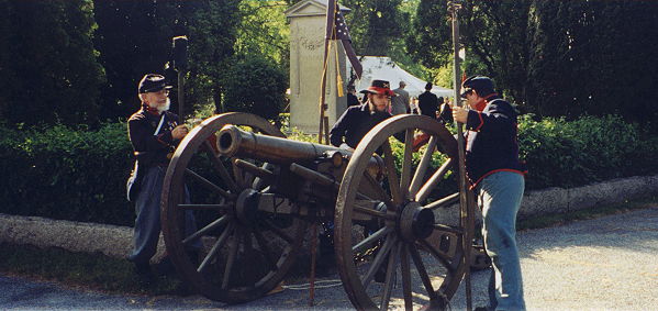 Members of Battery F prepare cannon for firing