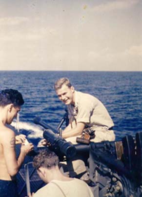 Jay Beam, overseeing the cleaning of the 40 mm gun