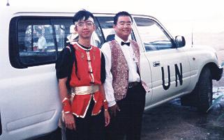 Posing next to a United Nations car