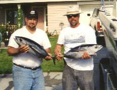 Bob and Tim holding tuna