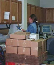 Cyndi ships boxes and boxes of microfilm