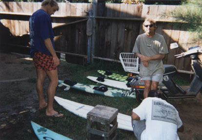 The Jaws tow-in brigade prepare their custom boards. Notice the footstraps.