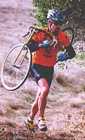 Mark running, comfortably with a cross bike