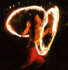 Fire twirlers form patterns at the Alexandra Gardens