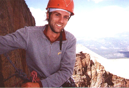 Rob belaying at the start of the corner system