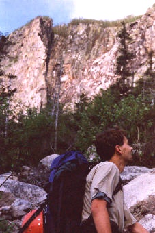 Benoit talus hopping on the approach -- the Whitney-Gilman Ridge is the prominent buttress left of center