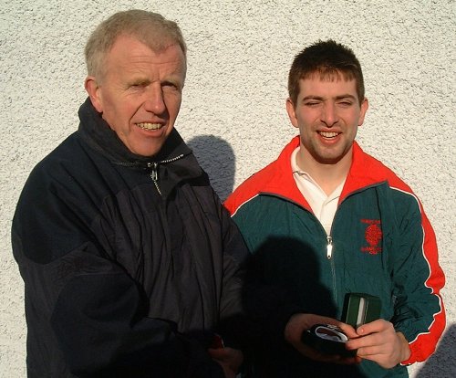 Glenfin man of the match Kevin McGlynn  with Brendan Magennis