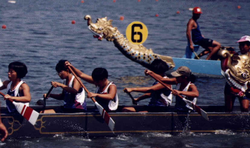 Preparing to race! This is the 12-men crew. But notice we have to use the full-sized dragonboat for the 12-crew races. For the Singapore Team we are sitting a gap apart on the boat.