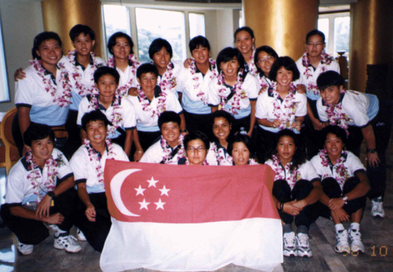 The ladies team with the country flag.