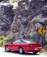 Red 1999 Chevrolet Camaro Z28 - Rear Left Side