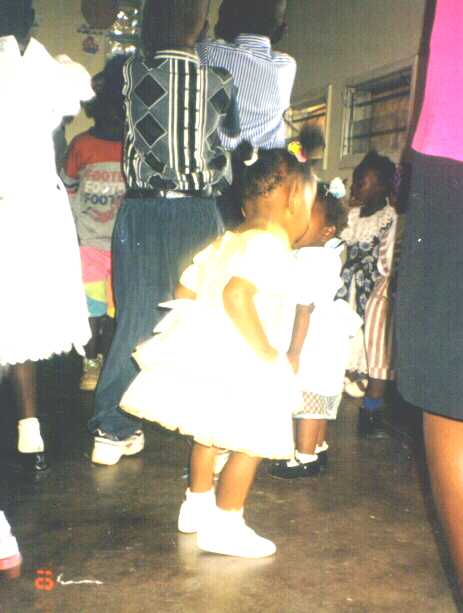 Chipo Mwiinga dancing on her 2nd B/day cake with her friends Mumba