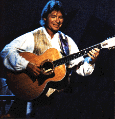 John Denver on stage