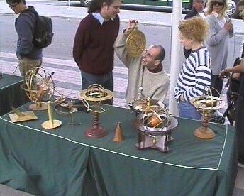 Passers-by admiring Brian's exhibits