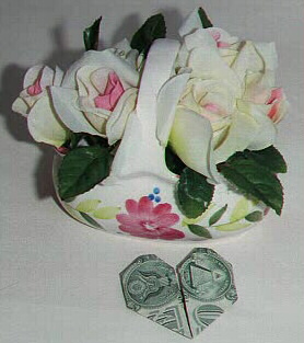 Roses in a ceramic basket, $1 folded