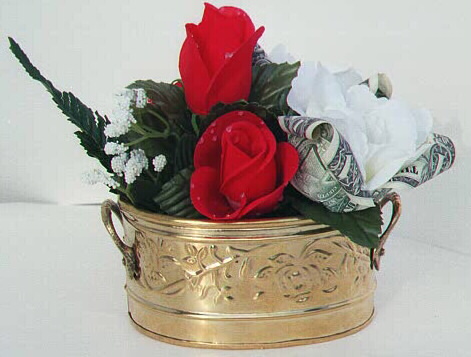 Roses in a brass container, contains $2