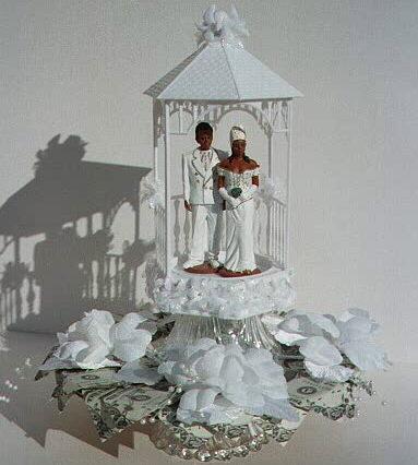 Wedding cake topper, contains $25