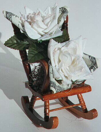 Roses on a rocking chair, contains $2