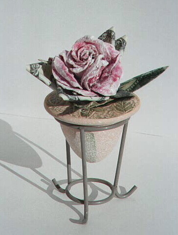 Rose in an urn #1, conatins $3