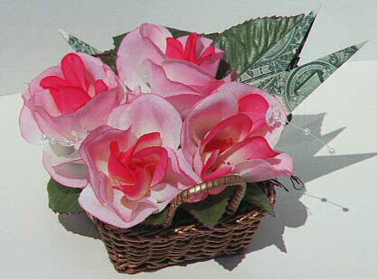 Roses in a wicker basket, contains $2