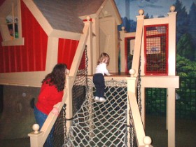 Kaitlin tries the treehouse out at Children's Science Museum