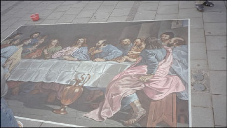 Last supper in chalk on sidewalk on Munich Marienplatz.