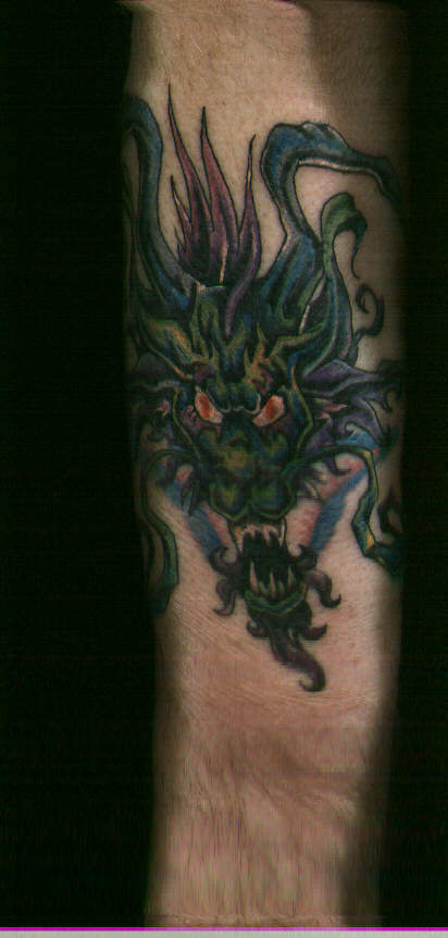 Dragon Face Tattoo