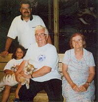 Family photo with ferocious real honest to good tigers.