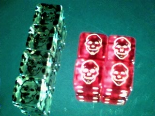 Unknown Death Dice (Red set pips & skulls glow in the dark)