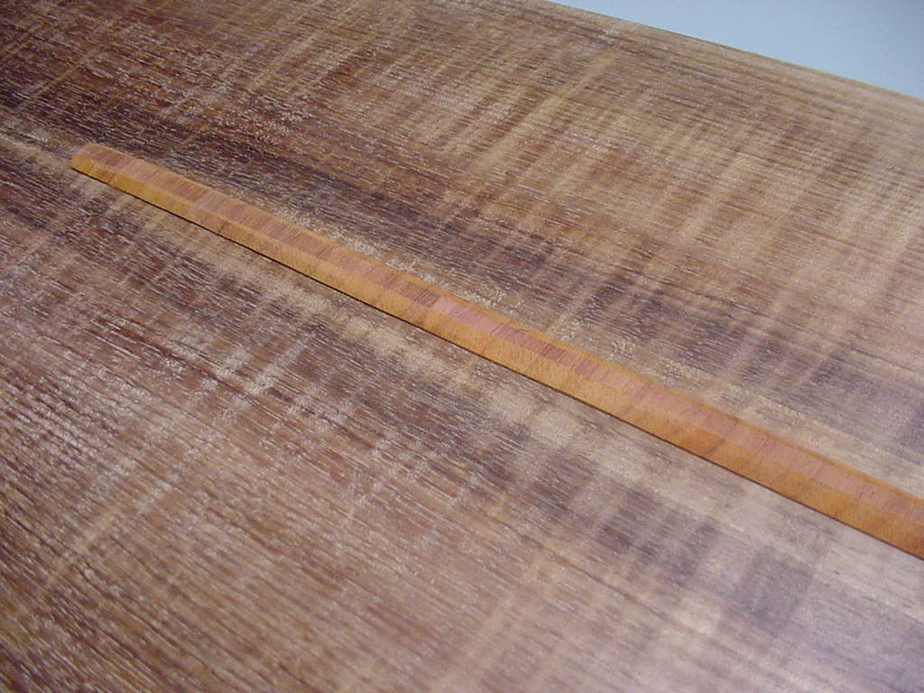 Limba-Blackwood Back w/ Padauk Center Brace.