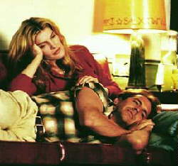 Rene Russo and Kevin Costner before the morphing...