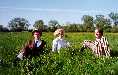 Three people in a field