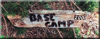 Base Camp carved in driftwood.