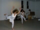 Wide angle shot of two women dancing.    Click to enlarge.